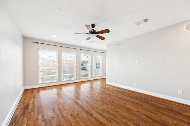 6649 Fairfield St, Houston, TX 77023 - unfurnished room featuring wood finished floors, baseboards, a ceiling fan, and recessed lighting