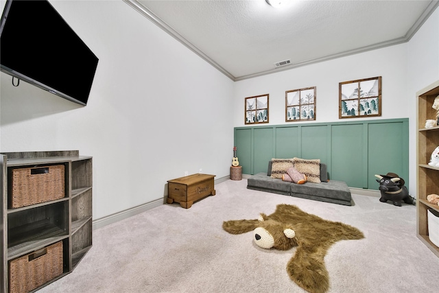 28111 Middlewater View Ln, Katy, TX 77494 - recreation room featuring carpet floors, ornamental molding, and a decorative wall