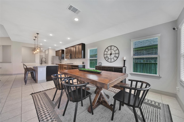 28111 Middlewater View Ln, Katy, TX 77494 - dining space featuring light tile patterned flooring, baseboards, and recessed lighting