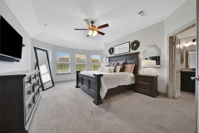 28111 Middlewater View Ln, Katy, TX 77494 - bedroom featuring light colored carpet, baseboards, a ceiling fan, and ensuite bath