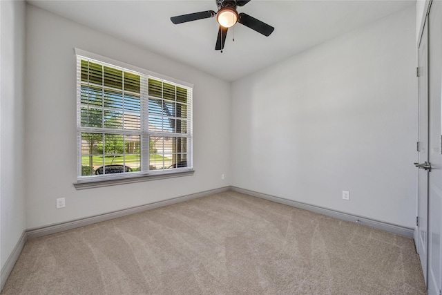 28111 Middlewater View Ln, Katy, TX 77494 - unfurnished room with carpet floors, baseboards, and a ceiling fan