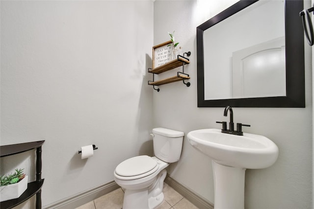 28111 Middlewater View Ln, Katy, TX 77494 - half bath featuring toilet, tile patterned floors, and baseboards