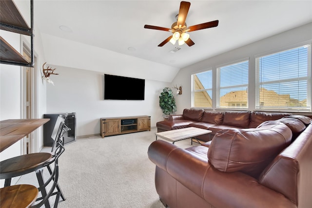 28111 Middlewater View Ln, Katy, TX 77494 - living area with light carpet, ceiling fan, and vaulted ceiling