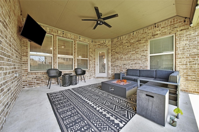 28111 Middlewater View Ln, Katy, TX 77494 - view of patio / terrace with a ceiling fan and an outdoor living space with a fire pit