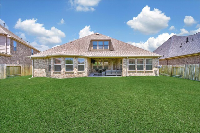 28111 Middlewater View Ln, Katy, TX 77494 - rear view of property with brick siding, a patio, and roof with shingles