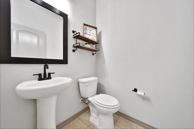28111 Middlewater View Ln, Katy, TX 77494 - bathroom featuring baseboards, toilet, and tile patterned floors