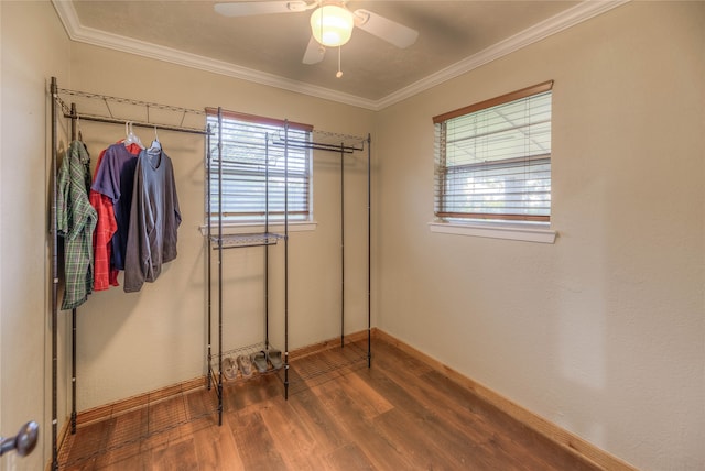 517 Lakeview Hbr, Onalaska, TX 77360 - unfurnished bedroom featuring wood finished floors, multiple windows, baseboards, and crown molding