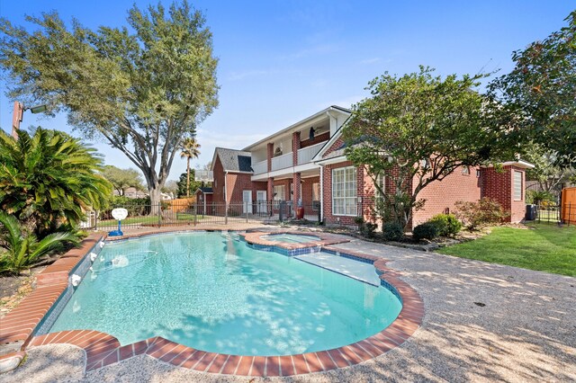 18226 Ennsbury Dr, Houston, TX 77084 - view of pool with a pool with connected hot tub