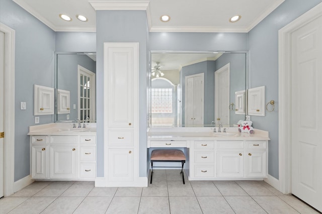 18226 Ennsbury Dr, Houston, TX 77084 - bathroom featuring vanity, ceiling fan, tile patterned flooring, baseboards, and ornamental molding