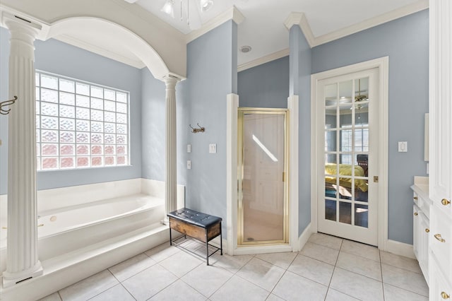 18226 Ennsbury Dr, Houston, TX 77084 - full bathroom featuring ornate columns, ornamental molding, a shower stall, a bath, and tile patterned flooring