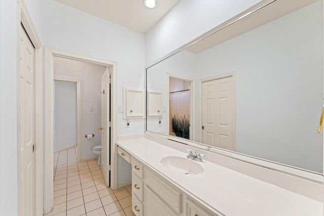 18226 Ennsbury Dr, Houston, TX 77084 - bathroom featuring tile patterned flooring, vanity, and toilet
