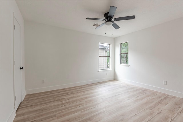 12034 Audubon Hill Ct, Houston, TX 77038 - unfurnished room featuring light wood finished floors, baseboards, and a ceiling fan