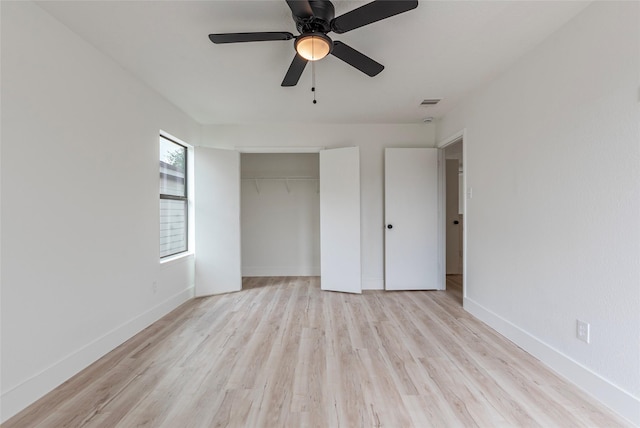 12034 Audubon Hill Ct, Houston, TX 77038 - unfurnished bedroom featuring light wood-style floors, baseboards, a closet, and ceiling fan