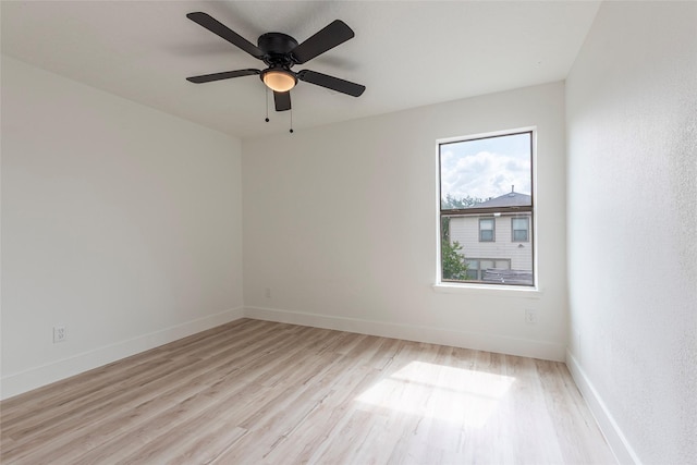 12034 Audubon Hill Ct, Houston, TX 77038 - unfurnished room featuring light wood-type flooring, baseboards, and a ceiling fan