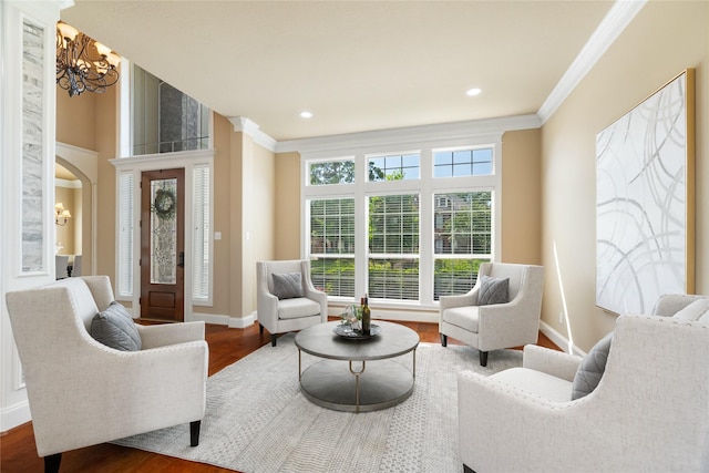 5811 Cimmaron Creek Ct, Spring, TX 77379 - living area featuring ornamental molding, a chandelier, baseboards, wood finished floors, and recessed lighting