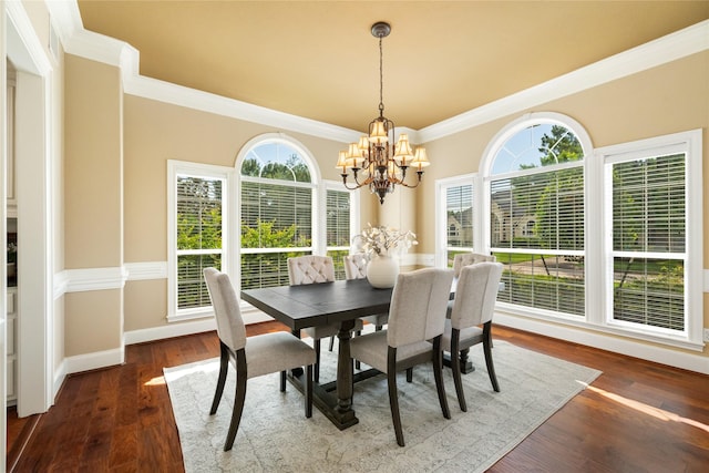 5811 Cimmaron Creek Ct, Spring, TX 77379 - dining space featuring crown molding, a chandelier, wood finished floors, and baseboards