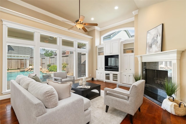 5811 Cimmaron Creek Ct, Spring, TX 77379 - living room featuring ceiling fan, dark wood-type flooring, crown molding, a high end fireplace, and recessed lighting