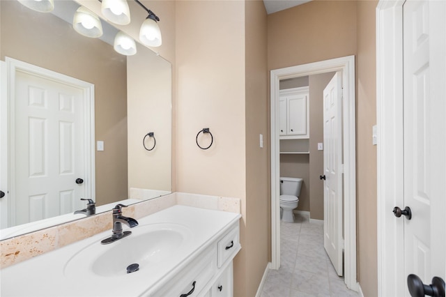 5811 Cimmaron Creek Ct, Spring, TX 77379 - bathroom featuring tile patterned floors, vanity, toilet, and baseboards