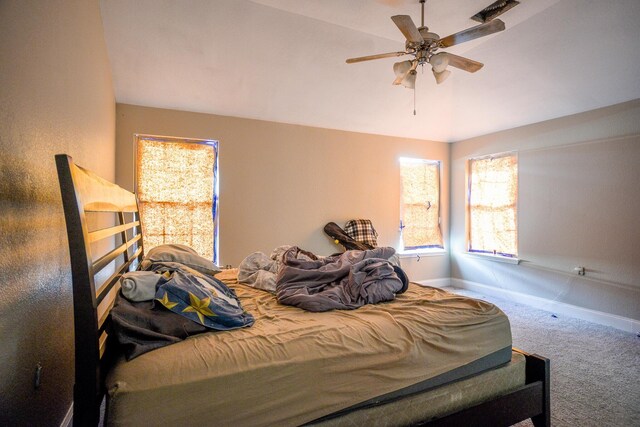 8000 Tee Dr, Austin, TX 78747 - bedroom with carpet flooring, baseboards, ceiling fan, and lofted ceiling