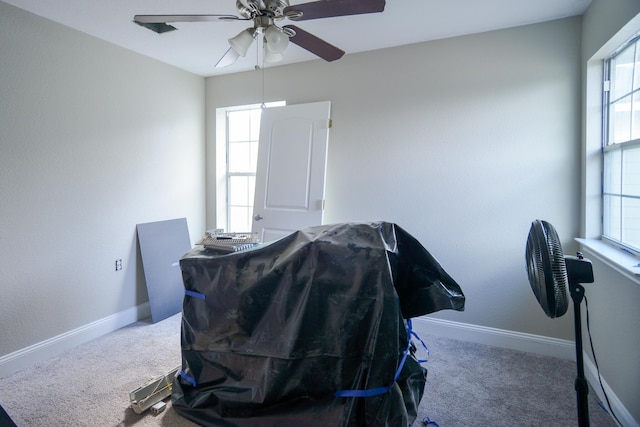 8000 Tee Dr, Austin, TX 78747 - office area with a ceiling fan, carpet floors, and baseboards