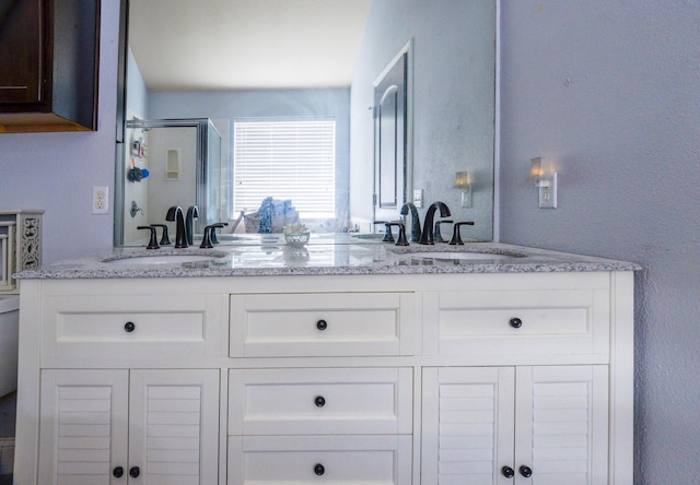 8000 Tee Dr, Austin, TX 78747 - full bathroom with double vanity and a stall shower