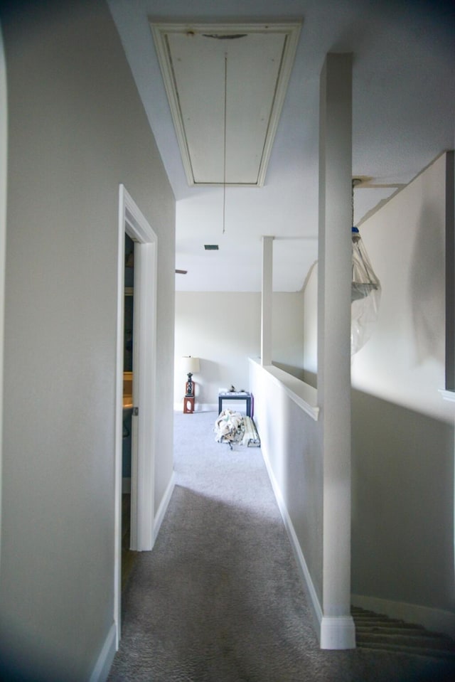 8000 Tee Dr, Austin, TX 78747 - hallway featuring attic access, carpet floors, and baseboards