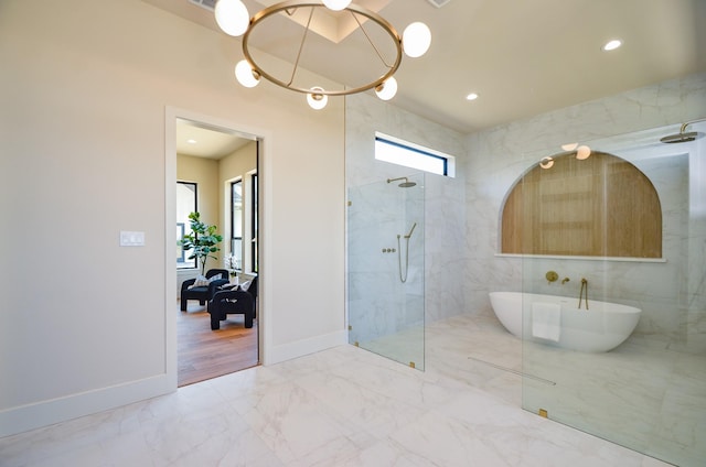 20218 Tealpointe Ridge Ln, Tomball, TX 77377 - full bath featuring marble look tile flooring, a soaking tub, a marble finish shower, recessed lighting, and a chandelier