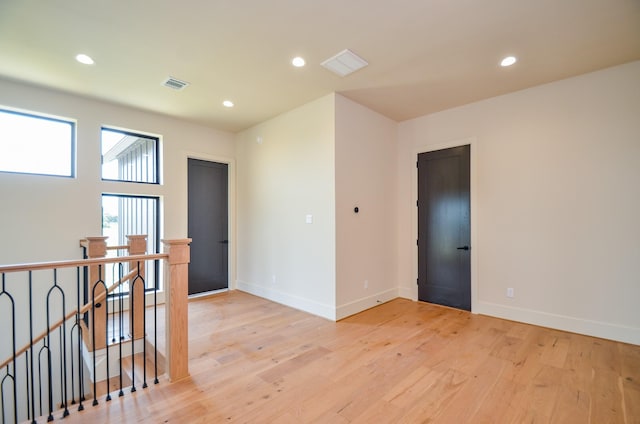 20218 Tealpointe Ridge Ln, Tomball, TX 77377 - spare room featuring light wood-style floors and recessed lighting