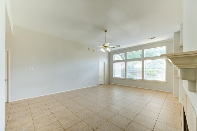 19814 Lindenfield Pl, Katy, TX 77449 - unfurnished living room featuring light tile patterned floors, a ceiling fan, and baseboards