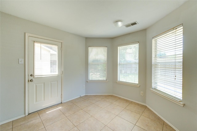19814 Lindenfield Pl, Katy, TX 77449 - spare room with light tile patterned flooring and baseboards