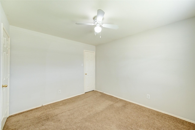 19814 Lindenfield Pl, Katy, TX 77449 - unfurnished room featuring light carpet, baseboards, and a ceiling fan