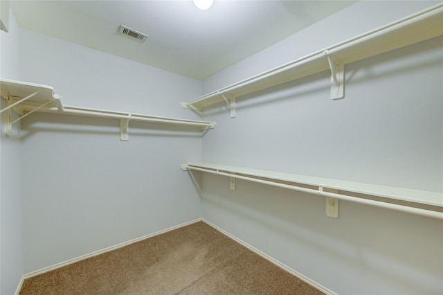 19814 Lindenfield Pl, Katy, TX 77449 - spacious closet featuring carpet floors