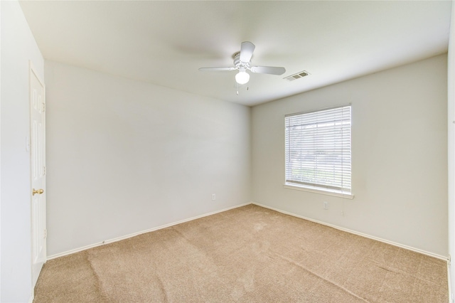 19814 Lindenfield Pl, Katy, TX 77449 - spare room with carpet flooring, a ceiling fan, and baseboards