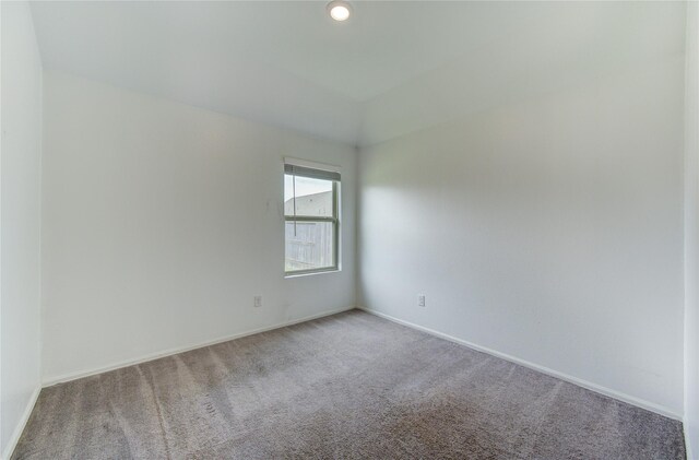 22619 Malvicino Dr, New Caney, TX 77357 - unfurnished room with carpet floors and baseboards