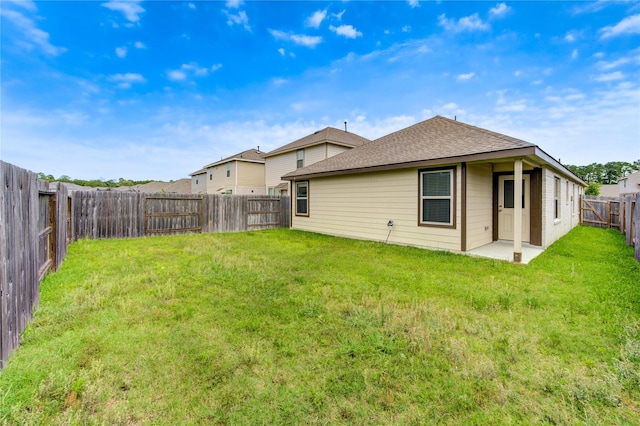 22619 Malvicino Dr, New Caney, TX 77357 - rear view of property with roof with shingles