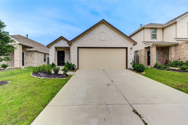 22619 Malvicino Dr, New Caney, TX 77357 - view of front of property with a garage, concrete driveway, brick siding, and a front lawn