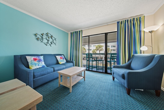 6102 Seawall Blvd Unit 175, Galveston, TX 77551 - carpeted living room with ornamental molding and a textured ceiling