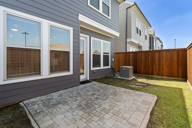 962 Ford Pines Ln, Houston, TX 77091 - view of patio / terrace featuring central air condition unit