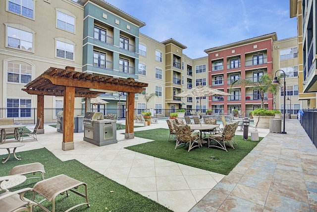 1711 Old Spanish Trl Unit 438, Houston, TX 77054 - view of patio / terrace featuring a pergola and a grill