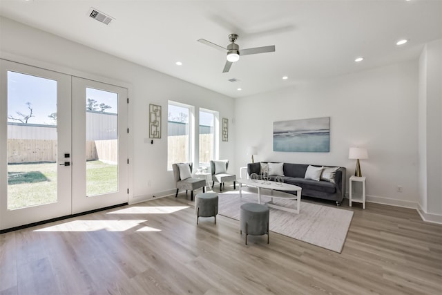 4917 Randon Rd, Houston, TX 77092 - living room featuring french doors, wood finished floors, baseboards, ceiling fan, and recessed lighting
