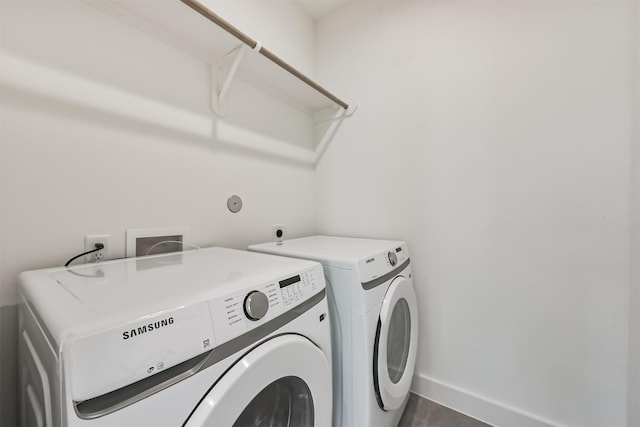 4917 Randon Rd, Houston, TX 77092 - laundry area featuring washer and clothes dryer and baseboards