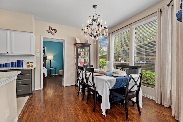 1881 Bering Dr Unit 25, Houston, TX 77057 - dining area with a chandelier, dark wood-type flooring, plenty of natural light, and baseboards