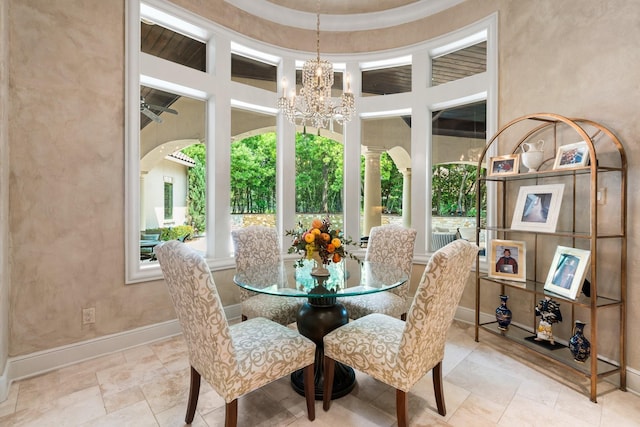 10 Maroon Creek Ct, Spring, TX 77389 - dining area featuring a chandelier