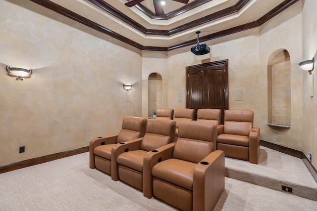 10 Maroon Creek Ct, Spring, TX 77389 - carpeted home theater room featuring arched walkways, crown molding, ceiling fan, baseboards, and a high ceiling