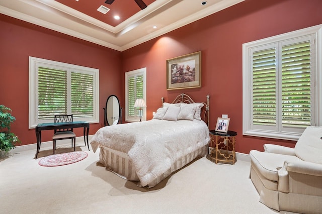 10 Maroon Creek Ct, Spring, TX 77389 - carpeted bedroom with crown molding, a raised ceiling, and baseboards