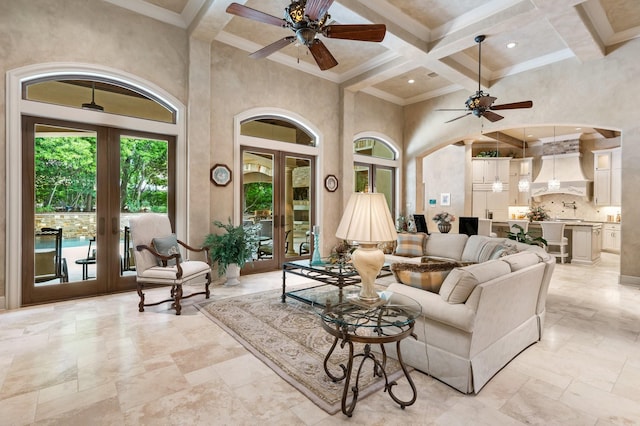 10 Maroon Creek Ct, Spring, TX 77389 - living room featuring french doors, a high ceiling, a ceiling fan, coffered ceiling, and beam ceiling