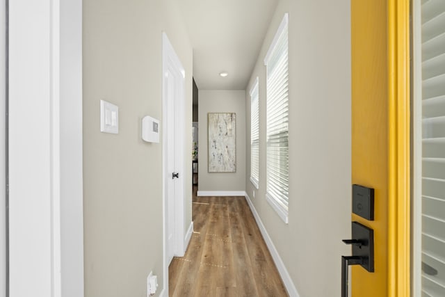 5809 Francis Oak Pl, Houston, TX 77091 - hallway with wood finished floors and baseboards