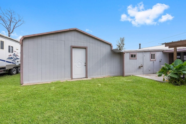 3840 N Fm 356, Onalaska, TX 77360 - back of house featuring a yard
