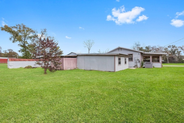 3840 N Fm 356, Onalaska, TX 77360 - view of green lawn featuring a sunroom