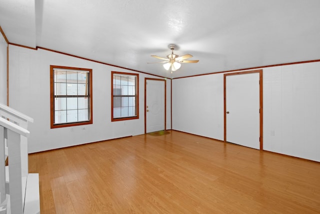 3840 N Fm 356, Onalaska, TX 77360 - unfurnished bedroom with light wood-style flooring, crown molding, and ceiling fan